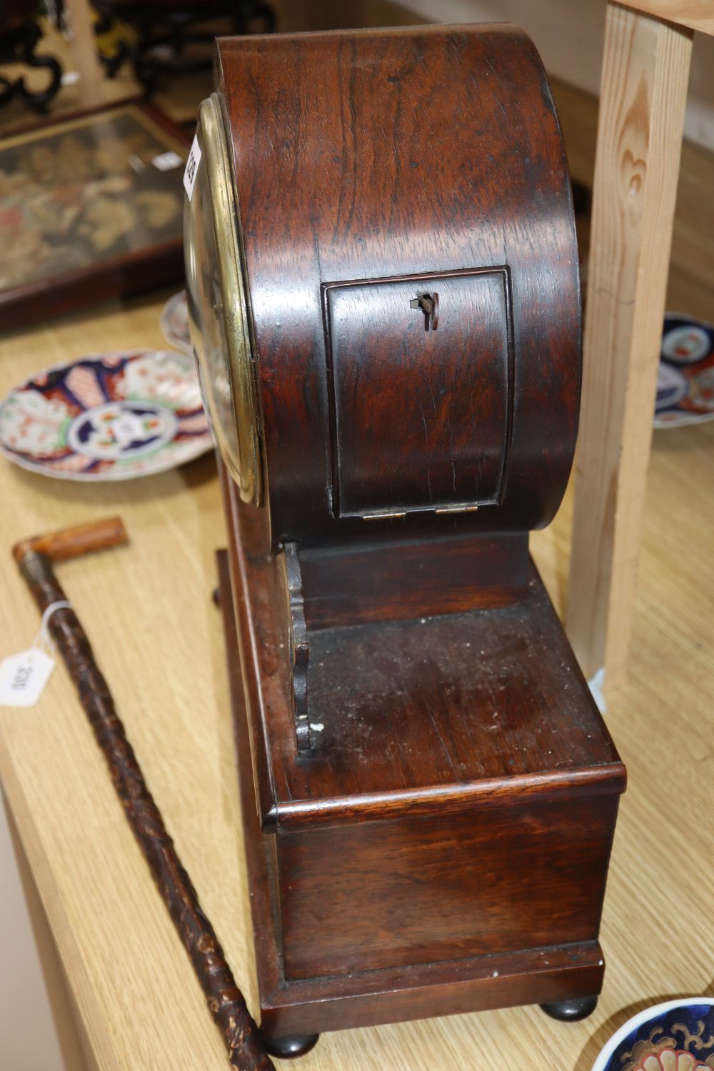 Ganthony of London. A brass inlaid rosewood mantel timepiece, height 44cm